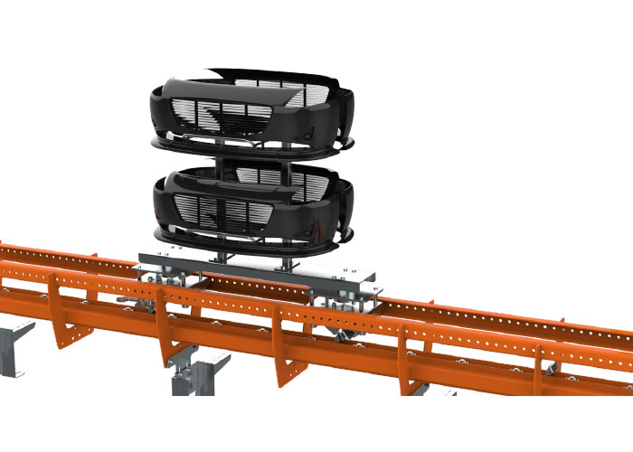 Het F2 Wide Track Power & Free vloertransportsysteem van Railtechniek van Herwijnen is ontworpen voor het stabiel transporteren van producten zoals kunststof auto-onderdelen en aluminium wielen.