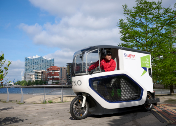 In een aantal grootsteden levert Mewa met e-cargobikes.