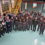 Het team van BASF Coatings in de Renaul-fabriek in Mauberge.