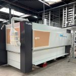 Het 12 meter hoge platenmagazijn, het startpunt van de geautomatiseerde productielijn, en de nieuwe vlakbedlaser staan al op hun plek.