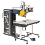 Een Rewigo puntlasmachine met borsteltafel.
